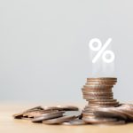 pénzérmék halomban százalékjellel